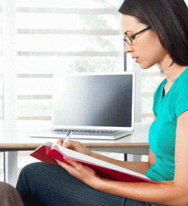girl writing a cover letter
